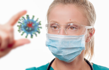 Dangerous respiratory 2019-nCov virus. Doctor in protective mask is holding Coronavirus, nCov....
