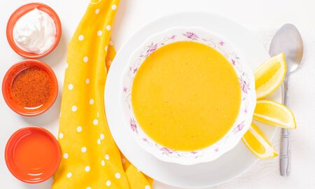 Healthy lunch food. Plate with lentil soup food. Vegetarian pumpkin soup.の写真素材