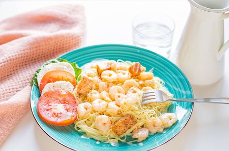 Italian Pasta with shrimps and creamy sauce. Spaghetti and shrimpsの写真素材