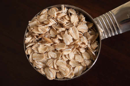 Close-up of Oatmeal in Measuring Cupの写真素材