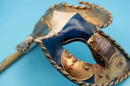 Venetian Mask Isolated on Blueの写真素材