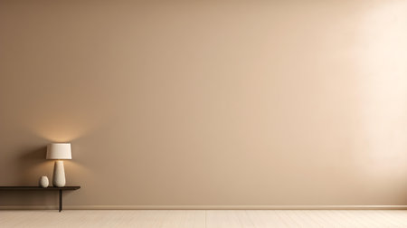 Beige wall with beautiful lighting. Elegant minimal background for product presentation.の素材