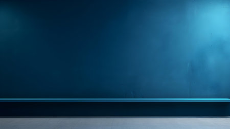 Blue wall with beautiful lighting. Elegant minimal background for product presentation.の素材