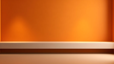 Orange wall with beautiful lighting. Elegant minimal background for product presentation.の素材