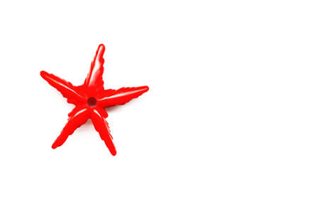Red star on a white background. The free space on the right - can be used for the different purposes.の写真素材
