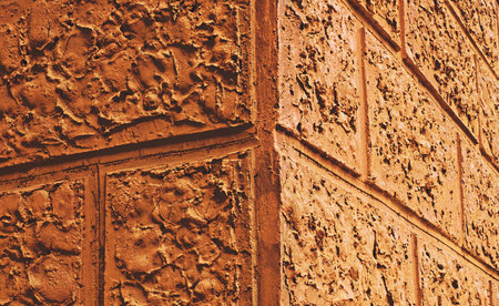 A decorative background, a corner of a wall of a building with original furnish.                