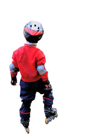 The young sportsman, the little boy on roller skates, a pure white background.                  の写真素材