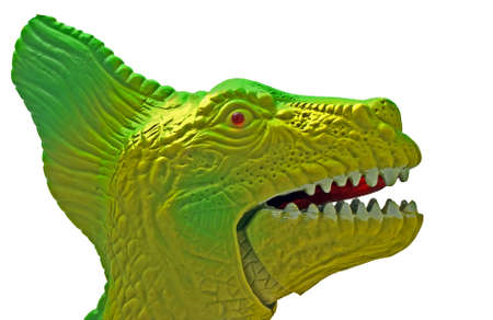 Head of dinosaur. Fragment of the Electromechanics toy from a plastic on a white background.の写真素材