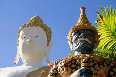 Buddha statue at Wat Doi Kham. Buddhist temple decoration in Chiang Mai, Northern Thailandの写真素材