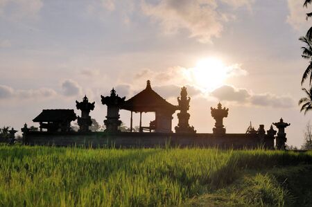 Hindu temple in green rice paddies near Ubud, Bali, Indonesiaの写真素材