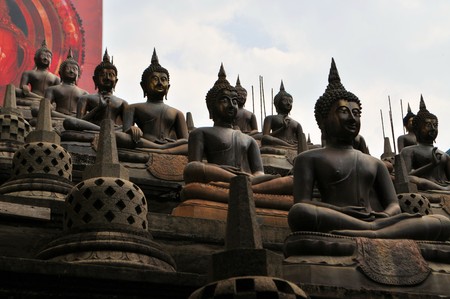 Set of Buddha statues and small stupas in Gangaramaya temple, Colombo Gangaramaya is an important Buddhist centers lies on the edge of Beira Lake.の写真素材