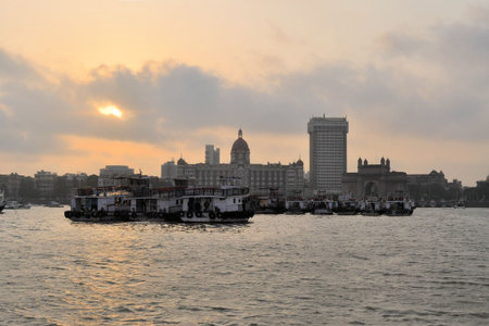 Mumbai harbor with Gate of India and Taj Mahal hotel, India
