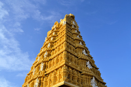 Tall entrance building of Hindu Temple at Chamundi Hills in Mysore, Indiaの写真素材