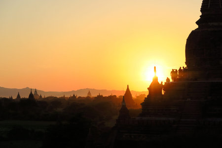 Pagoda at sunset at Bagans ancient temples in Northern Myanmar, Burmaの写真素材