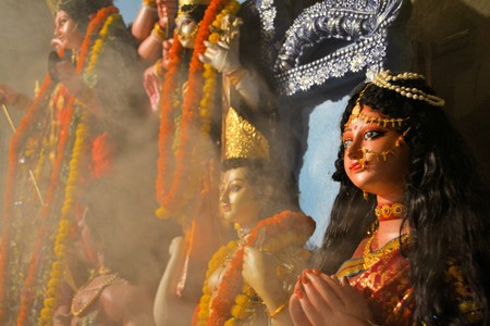 Kolkata, India - 9 October 2013:  An idol of revered goddess Durga standing in an unidentified pandal in the city of Kolkata during Durga Puja festival. A pandal is a temporary temple, erected during the week long religious festival of Durga Puja, one of のeditorial素材