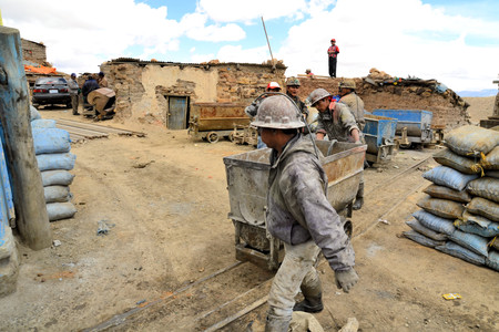 Potosi, Bolivia - 24 November 2012: Miners are standing just outside of the entrance to Cerror Rico mine, Potosi. Potosi is one of the highest cities in the world and nearby Cerro Rico has a long history for the extraction of rich deposits of silver, streのeditorial素材