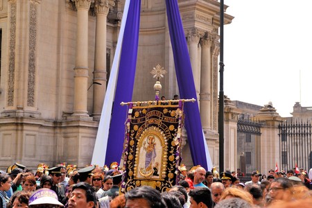 Lima, Peru - 18 October 2012: Idol of Lord of Miracles, one of the largest religious processions in the world. October is called Purple Month in Lima for the rich purple robes worn by the faithful catholics, who carry the centuries-old image of El Senor dのeditorial素材