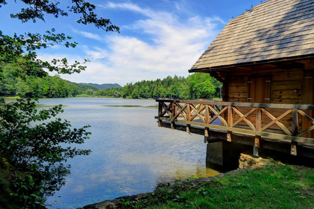 A wood cabin near a beautiful, clear, sunny day on Croatia's Lake TrakoÅ¡Äanの写真素材