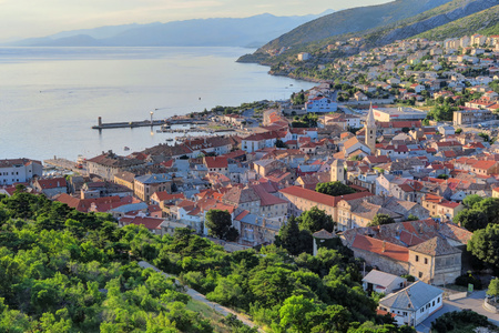 An aerial view of the Adriatic coast and Senj oldtown at duskの写真素材