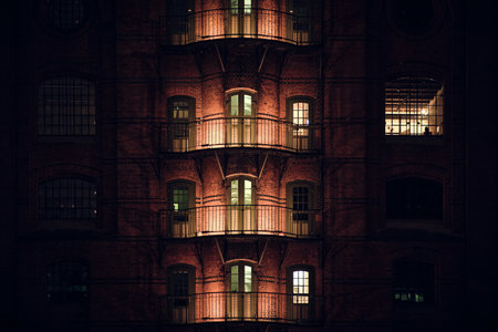 facade of building in Speicherstadt Hamburg at nightの写真素材