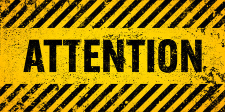 Warning sign with yellow and black diagonal lines. Attention, danger or caution symbol. Construction site signage, road safety notice, hazard banner, security alert shield. Vector illustrationのイラスト素材