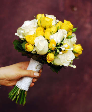 Yellow and white wedding bouquetの写真素材