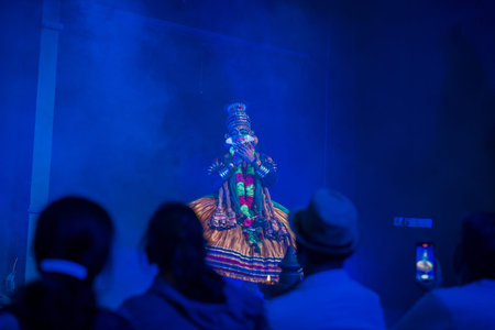 Munnar, India - March 10, 2023: A Kathakali dancer in elaborate traditional costume and makeup...