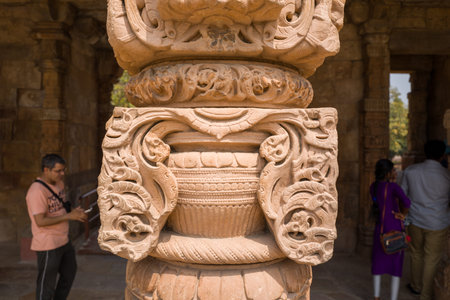 Delhi, India - March 30, 2024: The image shows a detailed close-up of an intricately carved stone...