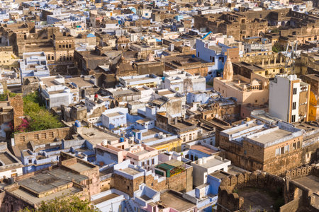 Bundi, India - March 20, 2022: The image shows an aerial view of the densely packed old town with a mix of historic stone buildings, blue-painted houses, and narrow streets under daylight.のeditorial素材
