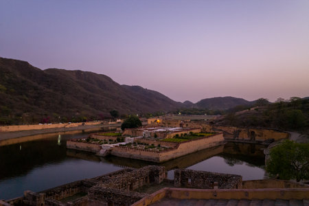 Jaipur, India - March 16, 2022: The rectangular Kesar Kyari gardens are situated on an island in the...