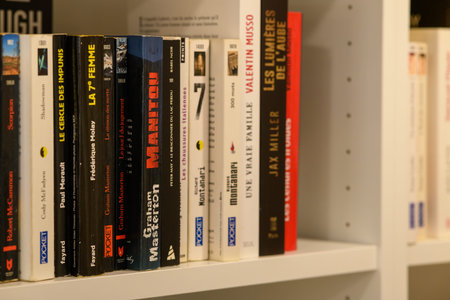 Unknown location - May 12, 2021: A close up view of upright French books by various authors,...