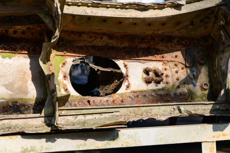 Hanoi, Vietnam - January 9, 2020: Close-up view of corroded and damaged aircraft fuselage with a...