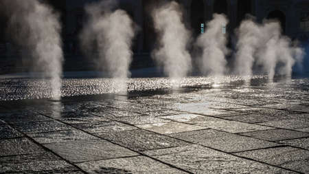 Steam fountains close-up from the groundの写真素材