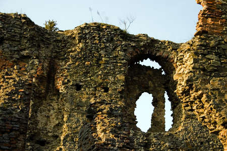 Late Gothic framing of the North Palace from Soimos castle.The internal yard. Situated on a hill nearby the european road E68 after the eastern entrance into the village Lipova-Romania. Royal castle, then owned by aristocrats, with a relatively well knownの写真素材