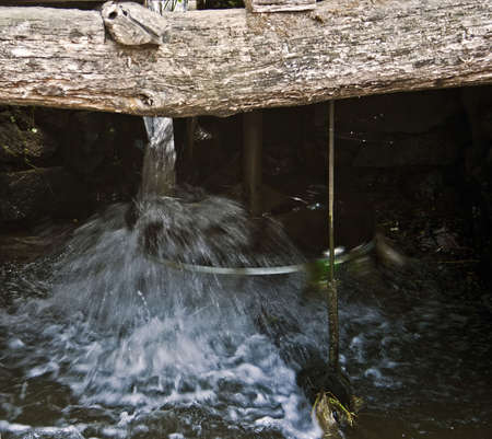 The watermills of Valea Rudariei, District Caras-Severin, Romania, are a testimony of the traditional tehnology in Banat.  A number of 22 mills along the water course, inside and otside the village, still exists. The mills are operated by a horizontal wheの写真素材