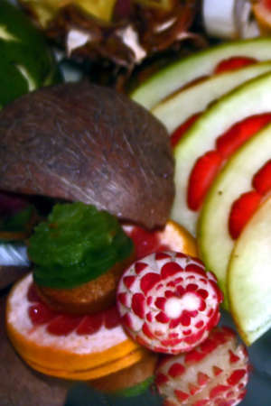 Arrangement of exotic and native fruit, with many decorations の写真素材
