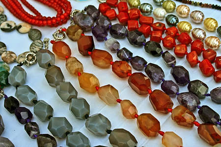 Different colored trinkets displayed in the waiting customers の写真素材