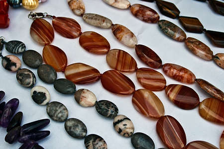 Different colored trinkets displayed in the waiting customers の写真素材