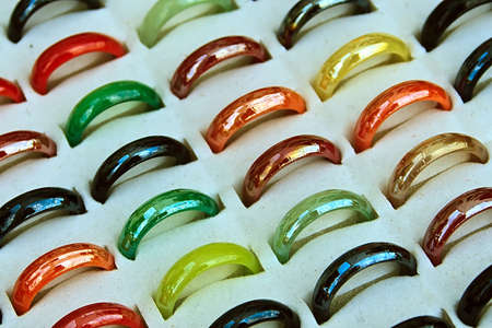 Different colored trinkets displayed in the waiting customers の写真素材
