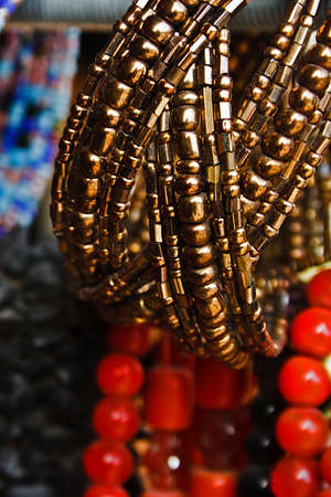 Different colored trinkets displayed in the waiting customers の写真素材