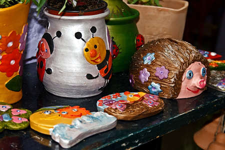 Different types of clay colored children at a workshopの写真素材