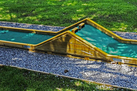 Small golf course built for children in a recreational space の写真素材