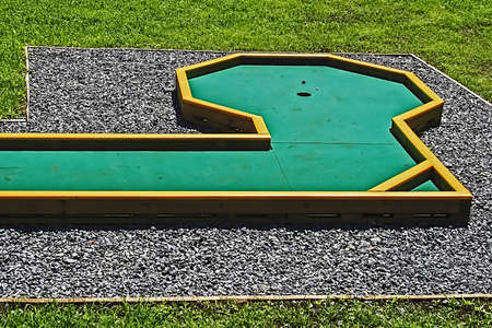 Small golf course built for children in a recreational space の写真素材