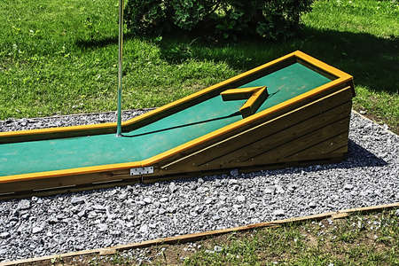 Small golf course built for children in a recreational space の写真素材