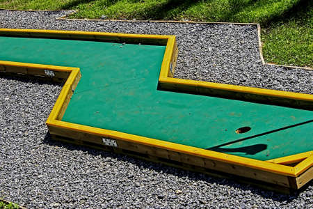 Small golf course built for children in a recreational space の写真素材