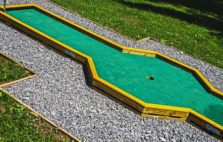 Small golf course built for children in a recreational space の写真素材