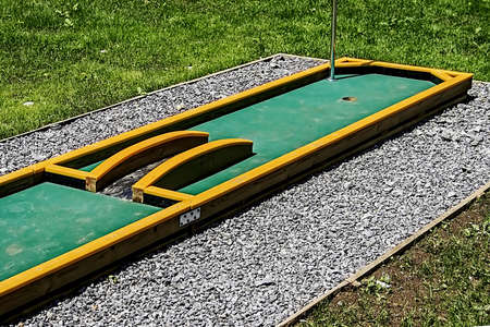 Small golf course built for children in a recreational space の写真素材