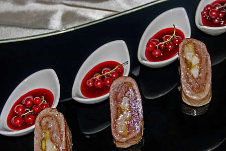 Arrangement cooking with different varieties of fish, meat and fruit の写真素材