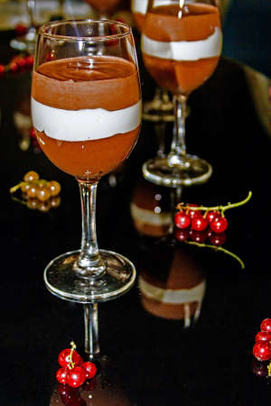 Arrangement of vanilla cream in various colors and fruits の写真素材
