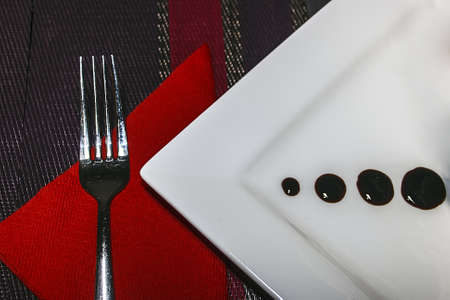 Part of an arrangement with a dish culinary square の写真素材